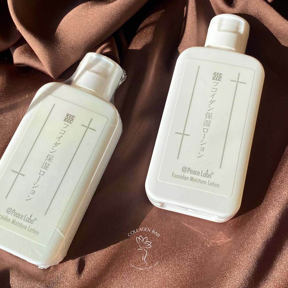 Две мини-баночки лосьона PEACE LABO Fucoidan Moisture Lotion в объеме 60 мл. на коричневой ткани